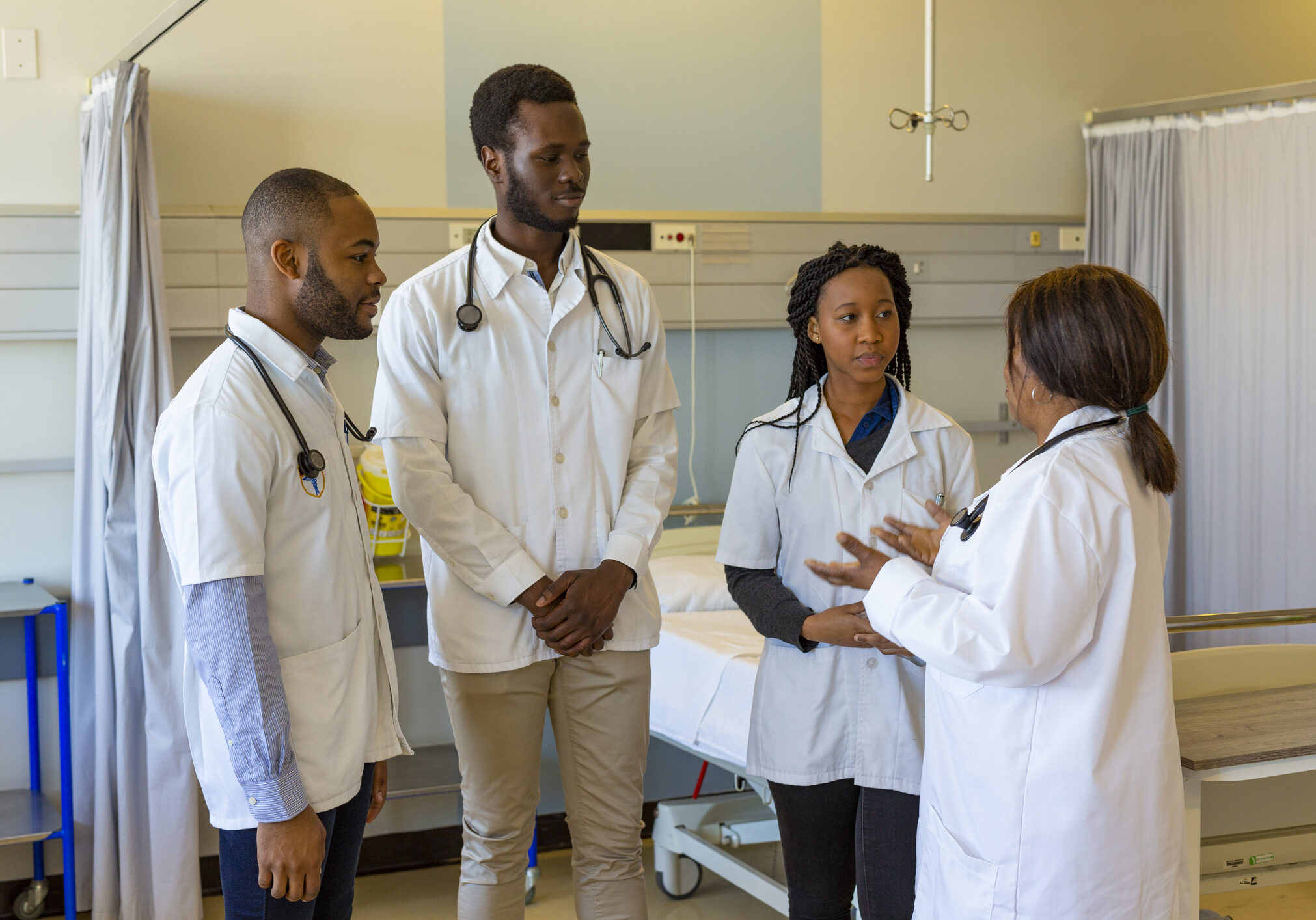 Group of African Doctors Discussing Medical Matters in a Hospital